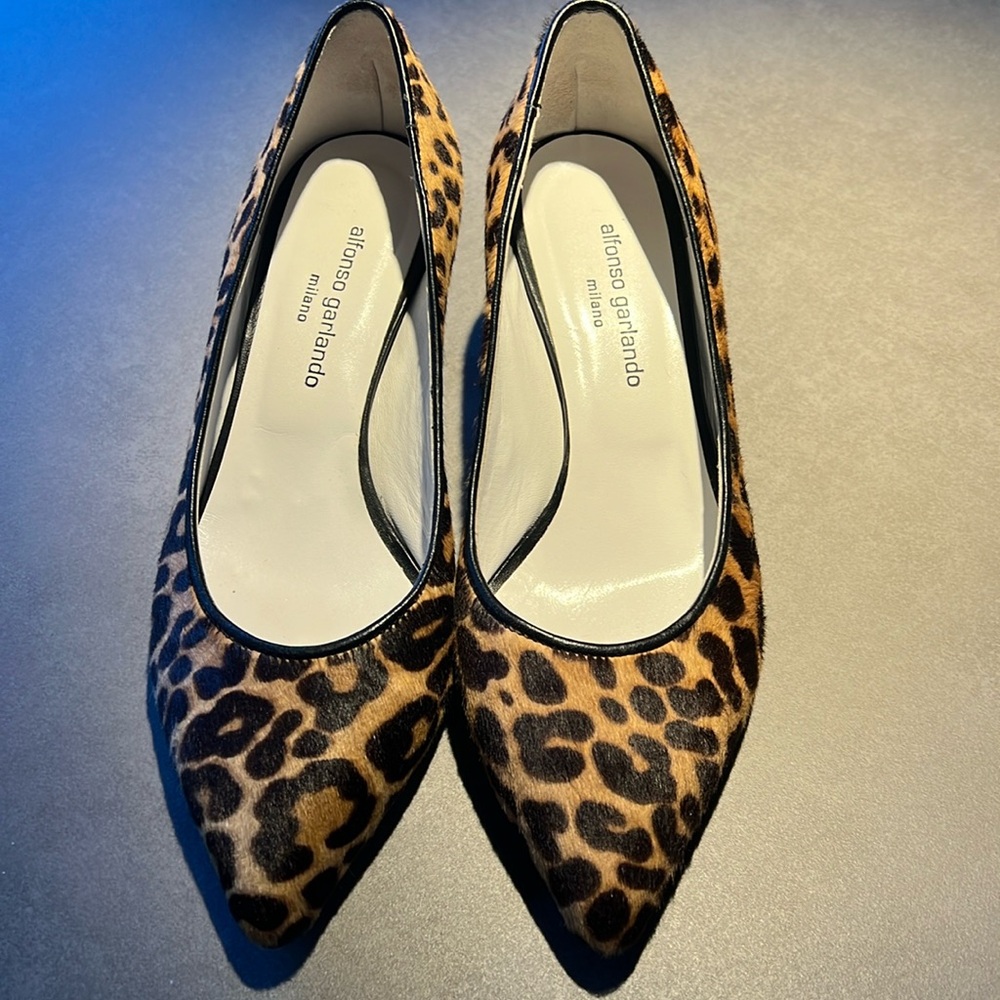 Réal fur leopard pumps. Made in Milan . Leather interior , very comfortable